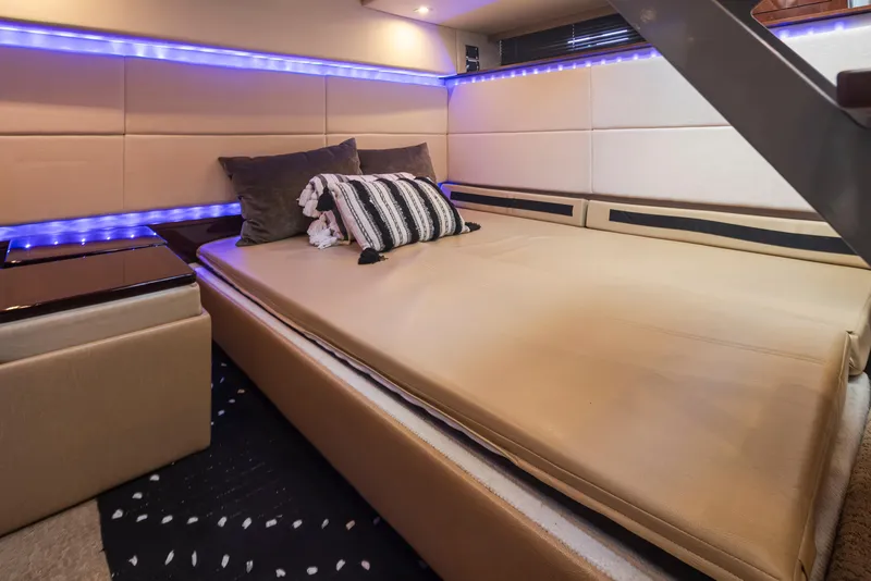 Slide: The Image of Luxurious cabin interior of 2010 Sea Ray Sundancer yacht with ambient lighting. - 37