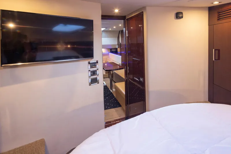 Slide: The Image of Interior of 2010 Sea Ray Sundancer yacht with TV and modern furnishings. - 42