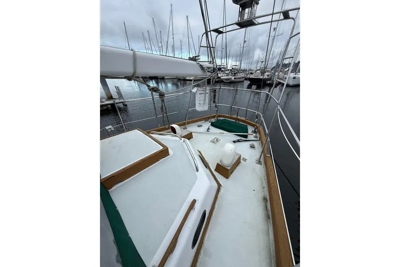 Slide: The Image of Sailboat deck view in marina, HMMD 46 model, 1990, overcast sky. - 5
