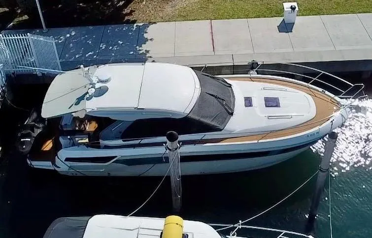 Slide: The Image of 2018 Bavaria S40 Coupe docked at marina, aerial view. - 12