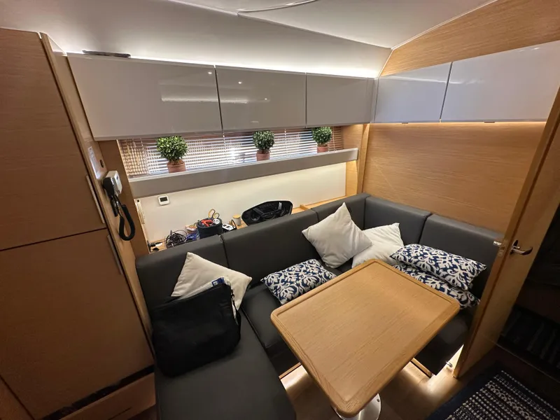 Slide: The Image of Interior of 2018 Bavaria S40 Coupe with cozy seating, cushions, and decorative plants. - 36