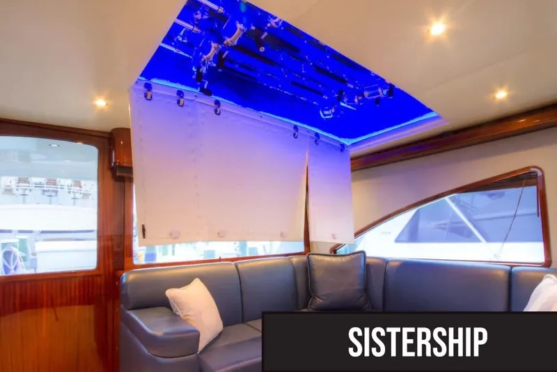 Slide: The Image of Luxurious interior of 2026 Titan Yachts sportfish, featuring elegant seating and ambient lighting. - 8