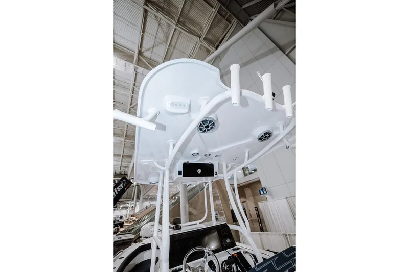 Slide: The Image of Manufacturer Provided Image: 2026 Parker 230 Coastal Elite boat interior with modern console and overhead features. - 9