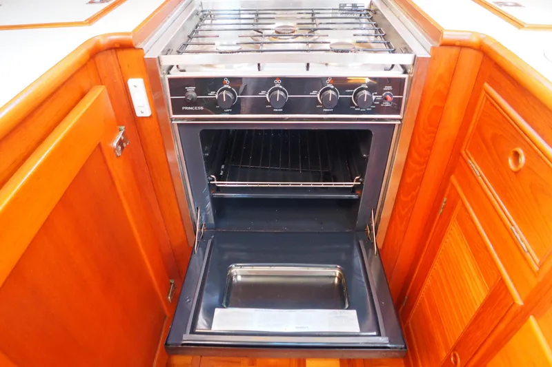 Slide: The Image of Stainless steel oven in 1995 Grand Banks 38 Eastbay EX yacht kitchen. - 16
