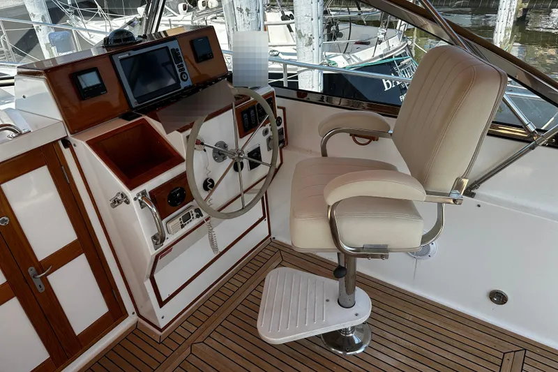 Slide: The Image of 1995 Grand Banks 38 Eastbay EX helm with leather seat. - 8
