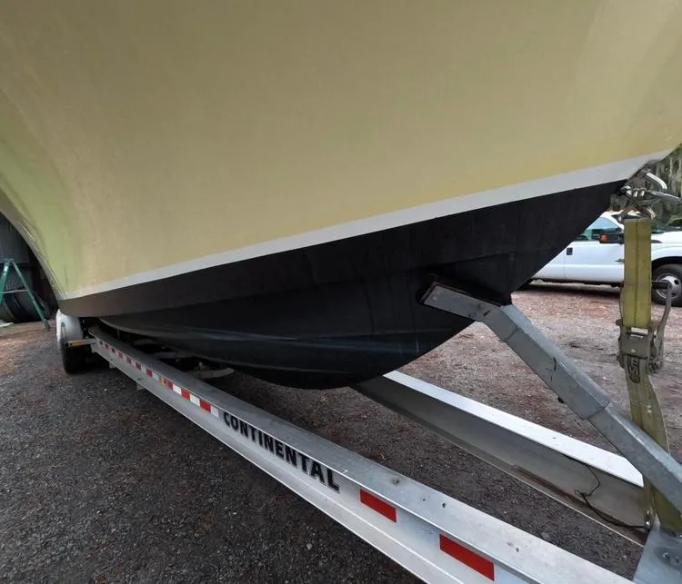 Slide: The Image of 2013 Regulator 34 Center Console boat on Continental trailer. - 14