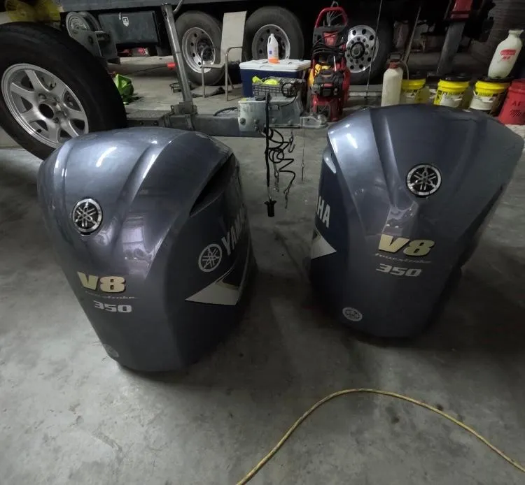 Slide: The Image of Two Yamaha V8 350 outboard engines in a garage setting. - 16