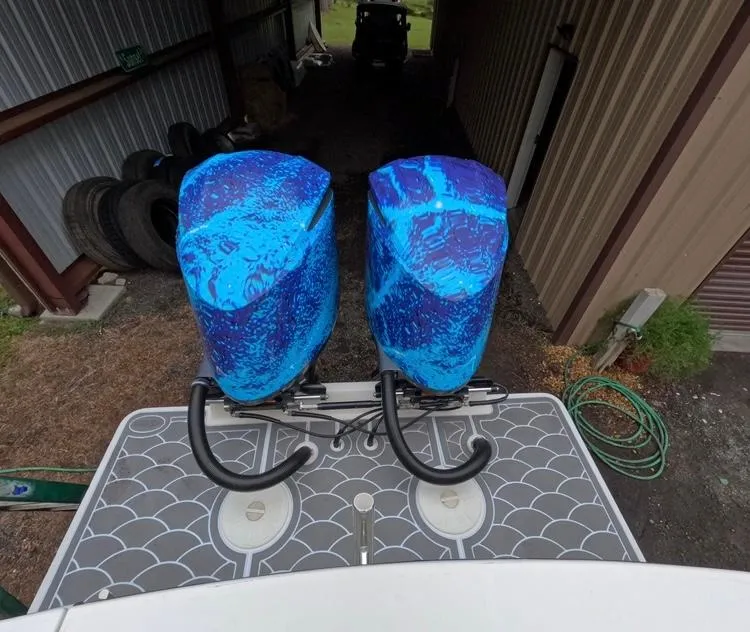 Slide: The Image of 2013 Regulator 34 Center Console with blue engine covers in storage. - 20