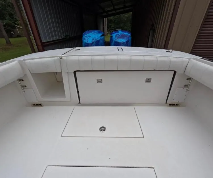 Slide: The Image of 2013 Regulator 34 Center Console boat interior with storage compartments. - 27