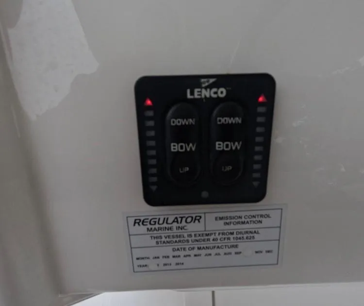 Slide: The Image of Lenco control panel on 2013 Regulator 34 Center Console boat. - 38