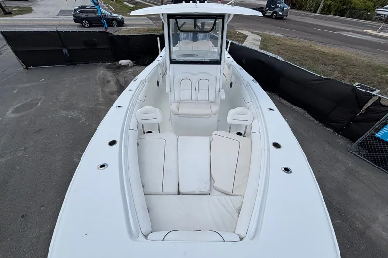 Slide: The Image of 2018 Sea Hunt Gamefish 30 Forward Seating boat with spacious deck and comfortable seating. - 100
