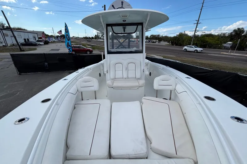 Slide: The Image of 2018 Sea Hunt Gamefish 30 Forward Seating boat with spacious deck and comfortable seating. - 101