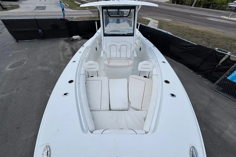 Slide: The Image of 2018 Sea Hunt Gamefish 30 Forward Seating boat with spacious deck and seating area. - 106