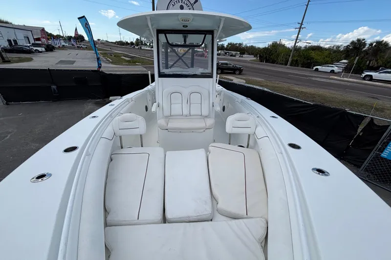 Slide: The Image of 2018 Sea Hunt Gamefish 30 boat with forward seating, parked on a lot. - 107