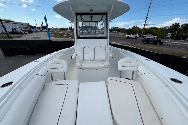 Slide: The Image of 2018 Sea Hunt Gamefish 30 Forward Seating boat with spacious white interior. - 108