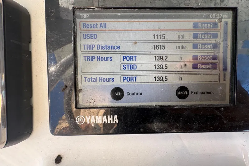 Slide: The Image of 2018 Sea Hunt Gamefish 30 boat with open storage compartment and life jackets. - 11