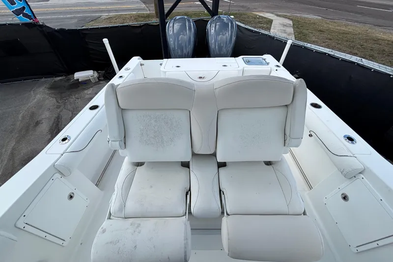 Slide: The Image of 2018 Sea Hunt Gamefish 30 boat with forward seating and dual engines. - 116