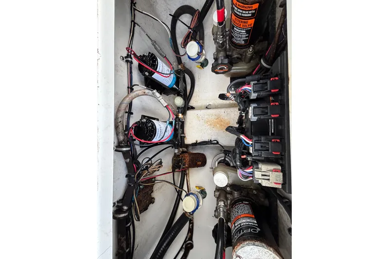 Slide: The Image of 2018 Sea Hunt Gamefish 30 Forward Seating boat wiring and hydraulic system components. - 122