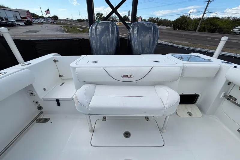 Slide: The Image of 2018 Sea Hunt Gamefish 30 boat interior with forward seating and dual engines. - 123