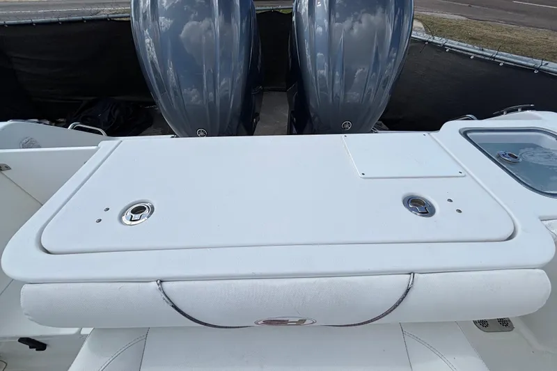 Slide: The Image of 2018 Sea Hunt Gamefish 30 boat with dual outboard motors and forward seating. - 137
