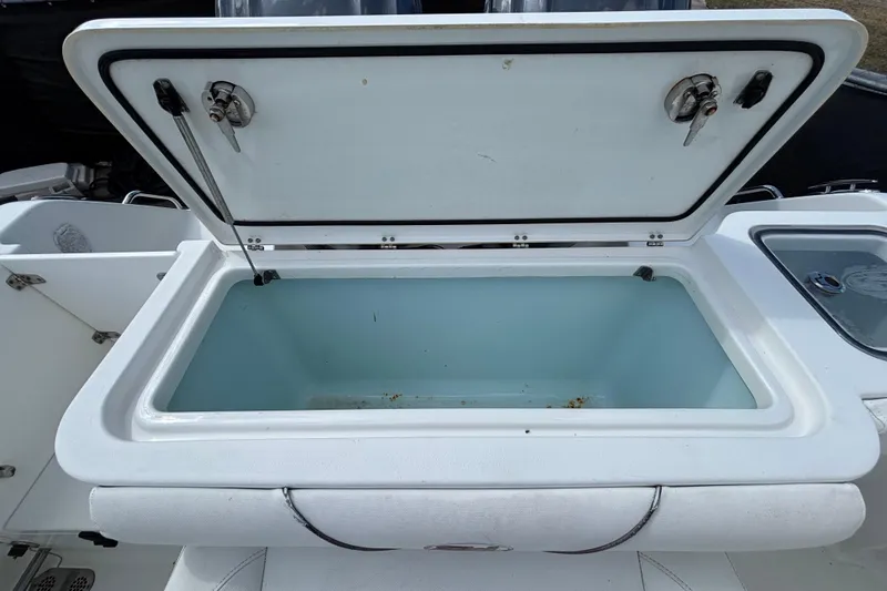 Slide: The Image of Open storage compartment on 2018 Sea Hunt Gamefish 30 Forward Seating boat. - 138