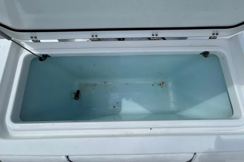 Slide: The Image of Open storage compartment on 2018 Sea Hunt Gamefish 30 Forward Seating boat. - 139