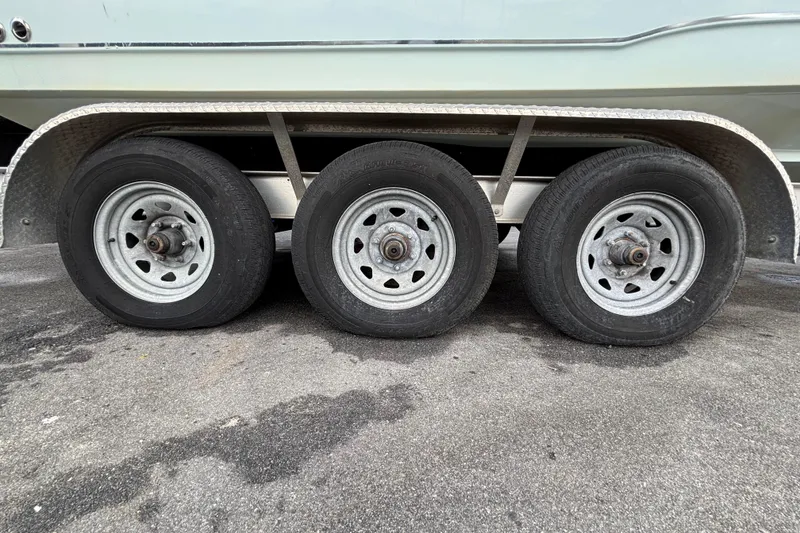 Slide: The Image of Hydrastar trailer brake actuator on Sea Hunt Gamefish 30, 2018 model, with clear sky background. - 150