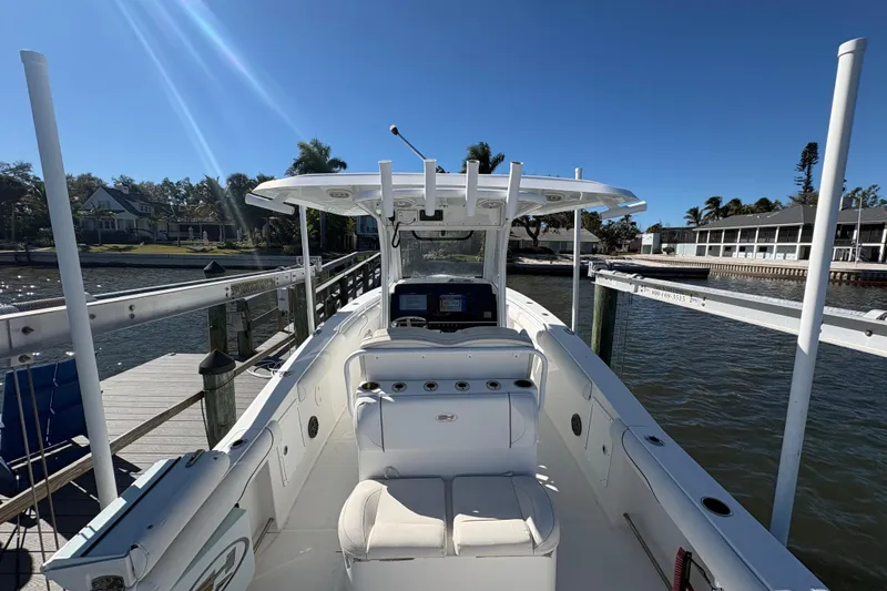 Slide: The Image of 2018 Sea Hunt Gamefish 30 Forward Seating boat interior with storage compartments. - 25