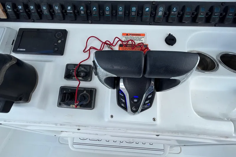 Slide: The Image of Control panel of 2018 Sea Hunt Gamefish 30 boat with Yamaha throttle and switches. - 54