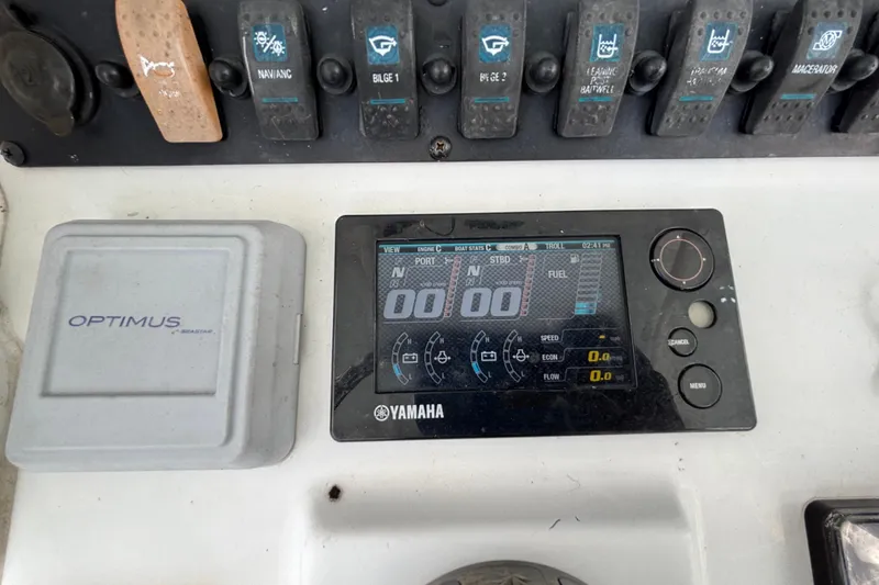 Slide: The Image of Control panel of a 2018 Sea Hunt Gamefish 30 with Yamaha display and Optimus system. - 55