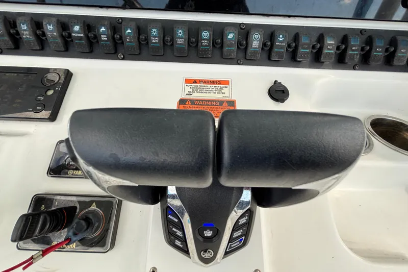 Slide: The Image of Control panel of 2018 Sea Hunt Gamefish 30 boat with Yamaha throttle and switches. - 58