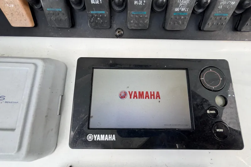 Slide: The Image of Yamaha control panel on 2018 Sea Hunt Gamefish 30 boat dashboard. - 60