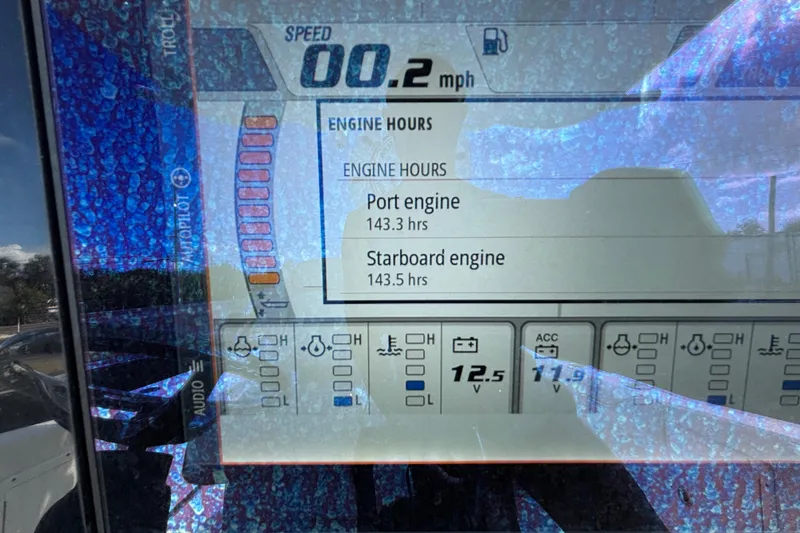 Slide: The Image of Display screen of 2018 Sea Hunt Gamefish 30 showing engine hours and speed. - 62