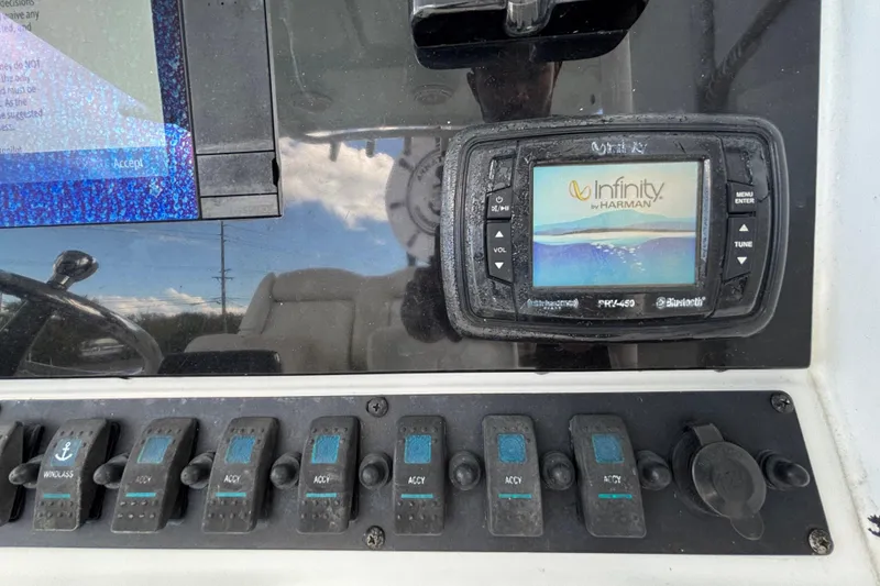 Slide: The Image of Control panel of 2018 Sea Hunt Gamefish 30 with Infinity by Harman display. - 63