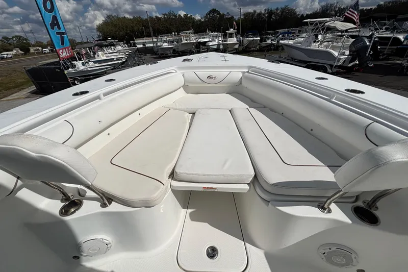 Slide: The Image of 2018 Sea Hunt Gamefish 30 Forward Seating boat with spacious white seating area. - 84