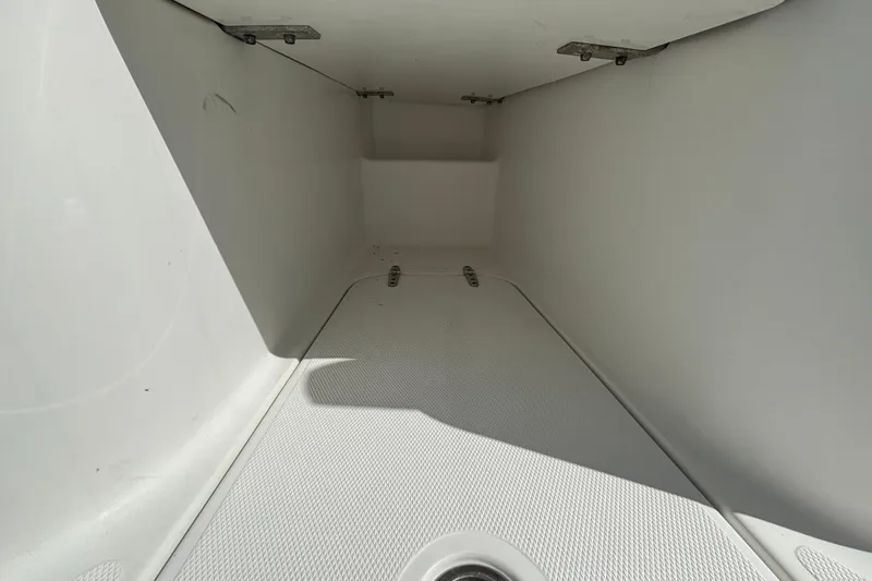 Slide: The Image of Interior storage compartment of 2018 Sea Hunt Gamefish 30 Forward Seating boat. - 87