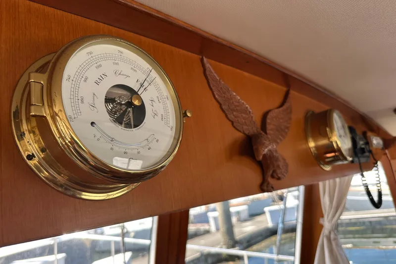 Slide: The Image of Barometer and eagle decor inside 2000 Eagle 40 Pilothouse Trawler. - 31