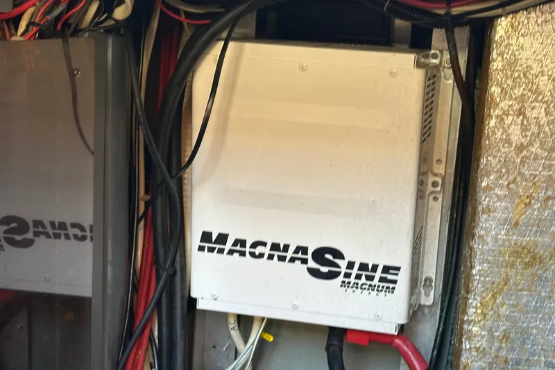 Slide: The Image of MagnaSine inverter in 2000 Eagle 40 Pilothouse Trawler engine room. - 63