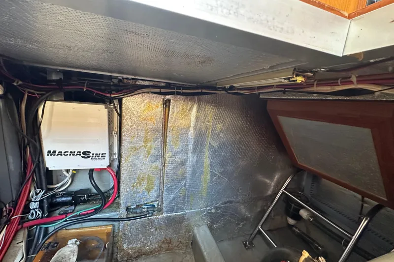 Slide: The Image of Engine room of 2000 Eagle 40 Pilothouse Trawler with electrical components and wiring. - 64