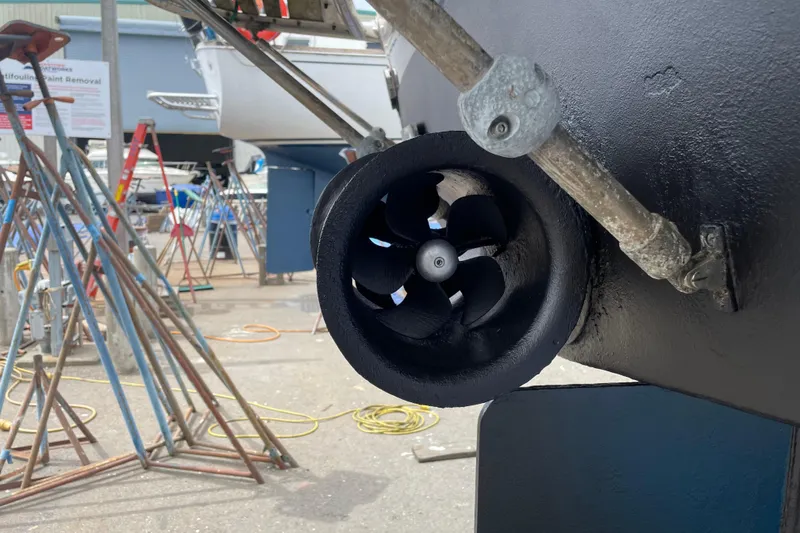 Slide: The Image of Bow thruster of 2000 Eagle 40 Pilothouse Trawler in a boatyard setting. - 71