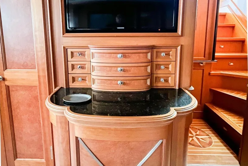 Slide: The Image of Luxurious wooden interior of 2001 Nordlund Enclosed Command Bridge with TV and drawers. - 17