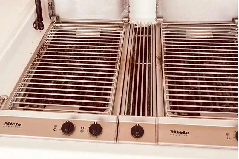 Slide: The Image of Built-in Miele grill on 2001 Nordlund Enclosed Command Bridge yacht. - 27