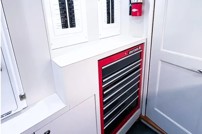 Slide: The Image of Red tool chest and electrical panels in 2001 Nordlund Enclosed Command Bridge. - 29