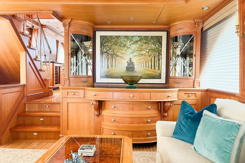 Slide: The Image of Luxurious Main Salon interior with elegant woodwork and artwork. - 6