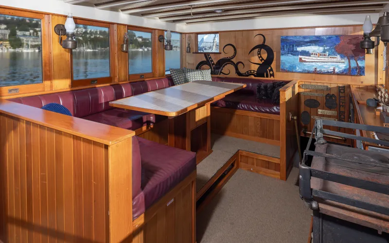 Slide: The Image of Interior of a 1931 Boeing Custom boat with wooden seating and nautical decor. - 41