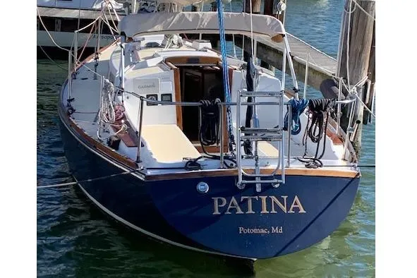 Slide: The Image of 1974 Tartan 30 sailboat named "Patina" docked in Potomac, Maryland. - 3