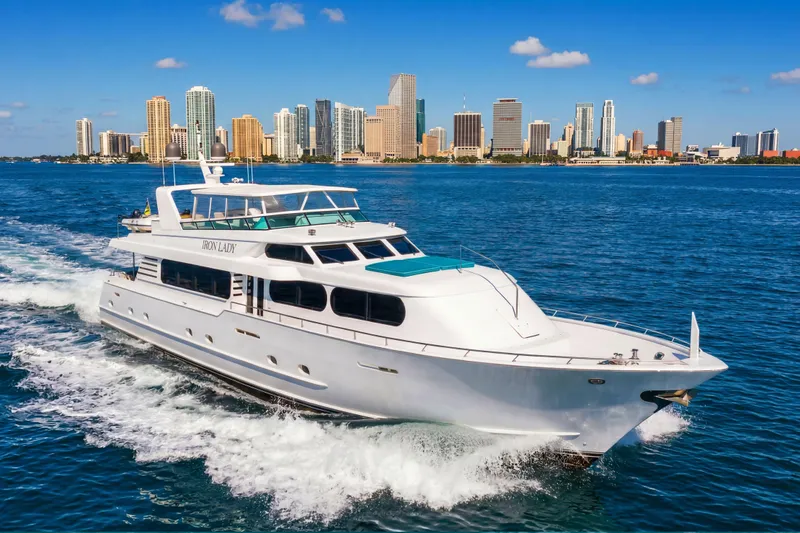 The Image of Luxury yacht "Iron Lady" cruising near city skyline, Broward Raised Pilothouse 2006 model. - 0