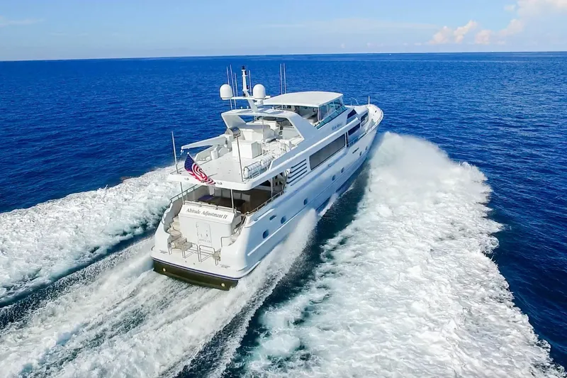 Slide: The Image of Luxury 2006 Broward Raised Pilothouse yacht cruising on open ocean waters. - 15