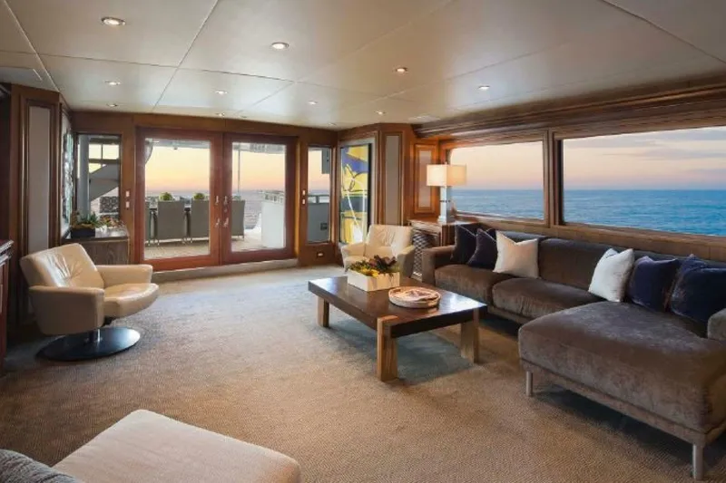 Slide: The Image of Luxurious 2006 Broward Raised Pilothouse yacht interior with ocean view and elegant furnishings. - 3