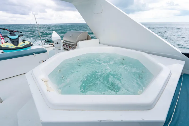 Slide: The Image of Luxurious 2006 Broward Raised Pilothouse yacht with jacuzzi and ocean view. - 32